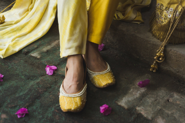 Yellow Tye and dye Juttis Embellished with Pearls and Embroidery